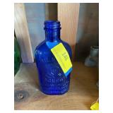 Cobalt blue milk of magnesia bottle