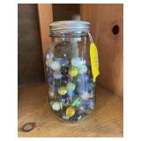 Ball mason jar, full of vintage marbles