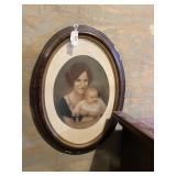 Large plaster oval frame with artist enhanced