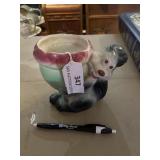 Vintage squirrel with a corn planter