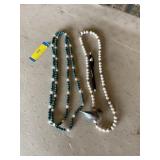 Green Bead necklace and one with a duck
