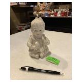 Handpainted, porcelain baby with rattle