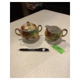 Antique creamer and sugar bowl with lid rose