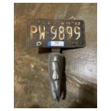 Vintage 1962 Texas license plate with bracket and