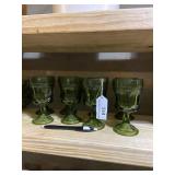 Anchor hocking eight stemmed green glasses