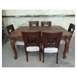 Louis XV oak dining table w/ 6 chairs; 1 chair leg