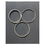 Set of three silver bangles