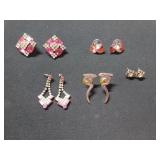 Five pair of costume earrings, mostly blingy and