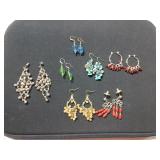 Seven pairs of costume earrings