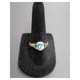 14 karat gold ring, size 7, blue topaz and cz?
