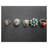 Five assorted silver? rings sized 5, 6, 7, 7, 10