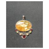 3 inch Stone pendant with red, green, and yellow