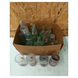 Lots of old Coke bottles, Dr pepper bottles,
