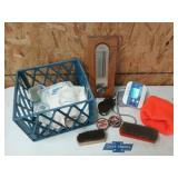 Blue crate with assorted items, mostly shoe