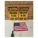 Two plastic caution signs, 18x12 in, and a car