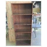 Dark brown bookshelf, 72 by 12 by 28, five shelves