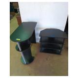 Two pieces of black furniture, desk is