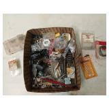 Contents of your kitchen junk drawer, it has