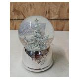 Musical Christmas snow globe