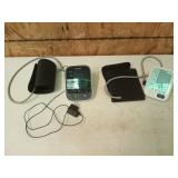 Two Omron blood pressure monitors