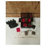 Oriental trinket box with assorted trinkets and