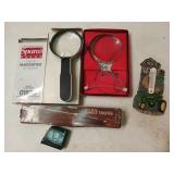 Asst magnifying glasses, candle snuffer, tape
