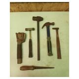 Assorted tools, mostly hammers