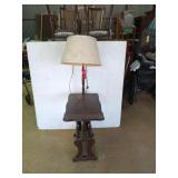 Interesting lamp, with side table and magazine