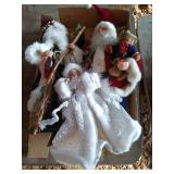 2 Santas and an angel tree topper.