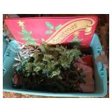 Teal container of Christmas decor
