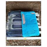 Pair of horse blankets, one is purple, one is blue