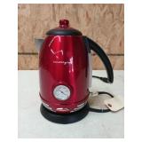 Vintage style electric coffee kettle on base,