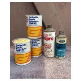 Three cans of 10w/40 and two of brake fluid
