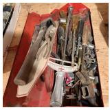 Red metal toolbox, full of tools and sockets and