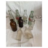 Vintage bottles; two old medicine bottles,