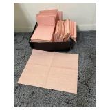 Box of Disposable Cleaning Towels in a slightly