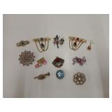 10 assorted pins, mostly red, blue, pink