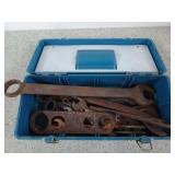 Various old tools in plastic toolbox