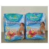 2 new packs of Pampers splashers size 5
