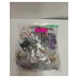 Mystery bag of assorted costume jewelry, mostly