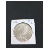 1886 Morgan silver dollar BU+