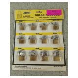 New 12 pack of small brass padlocks