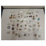 48 pairs of costume earrings, all for pierced ears