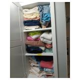 Cabinet of assorted towels