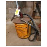 Oil pump on metal 5 gal bucket