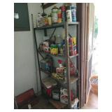 4 tier metal shelf with contents