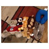 Box of assorted stuffed animals, neck pillow