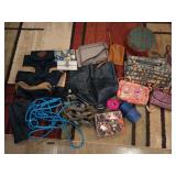 Plastic tub of assorted purses, some Vera