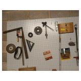 Contents on pegboard on back wall: framing