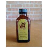 Dr. Scat typewriter cleaner, half full